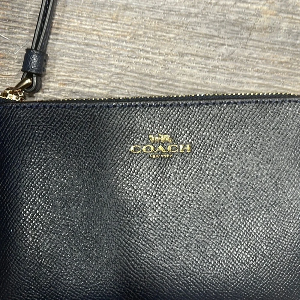 Coach corner zip